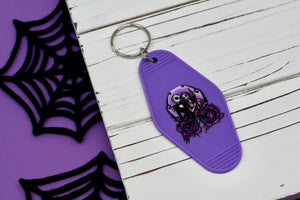 Spooky Couple Motel Keychain